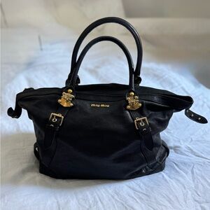 Miu Miu bow bag with gold hardware